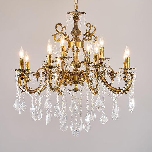Antique gold crystal chandelier with candle-style lights and hanging crystal prisms