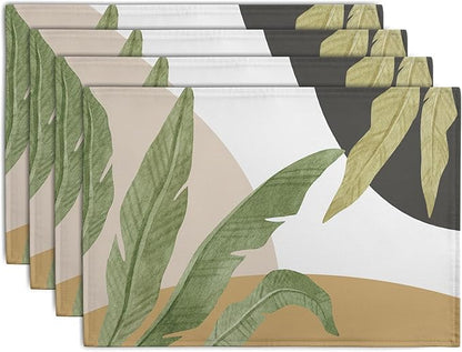 Set of 4 rectangular tropical leaf placemats, green banana and palm prints on light base