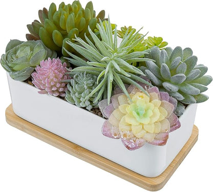 Rectangular faux succulent planter with assorted green and pastel succulents in white ceramic