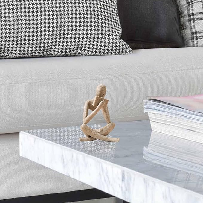 Sandstone abstract resin reading figurine, kneeling figure with cupped hands