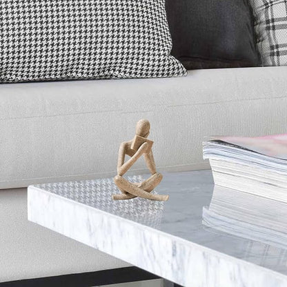 Sandstone abstract resin reading figurine, kneeling figure with cupped hands