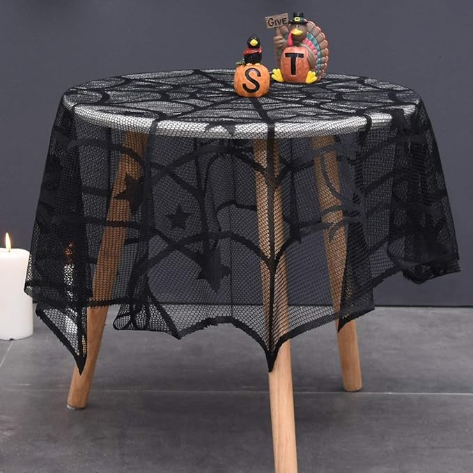 Round black mesh table cover with spider web, bats, and star pattern