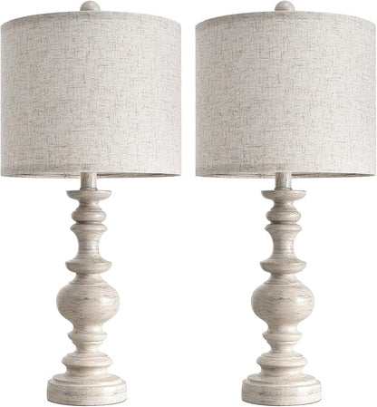 Set of two table lamps with gray linen drum shades and light whitewashed resin pedestal bases