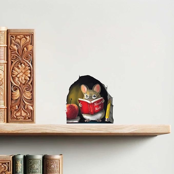 Mouse reading red book wall sticker centered on a light wooden shelf.
