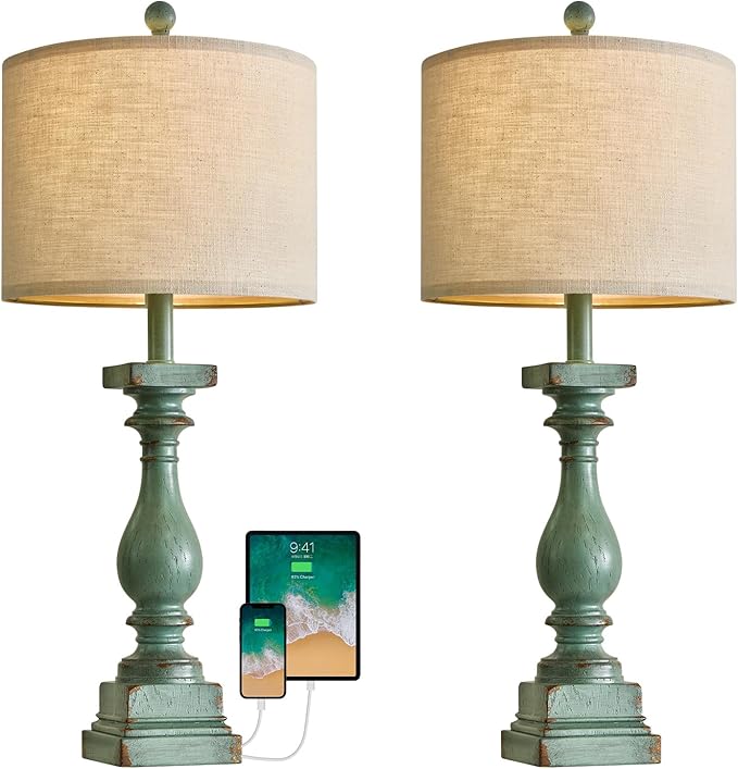Close-up of green resin table lamps with beige shades and USB cables