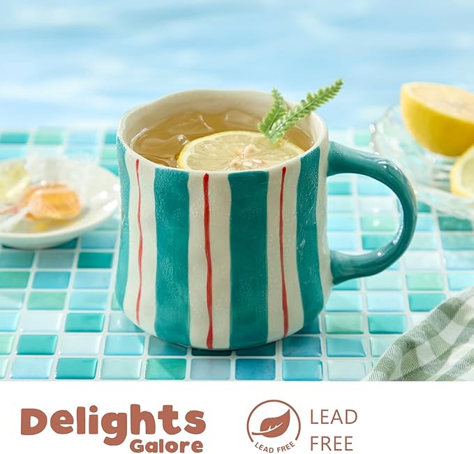 12oz ceramic coffee mug with teal and red vertical stripes, lemon slice in cup