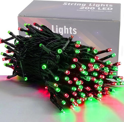 Red and green LED Christmas string lights on black wire, bunch close-up