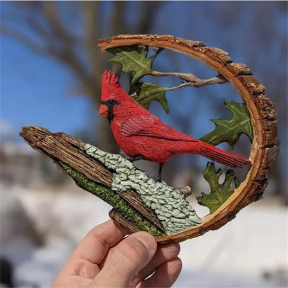 Wooden cardinal bird sculpture held in hand, red cardinal on leaf-and-branch arch