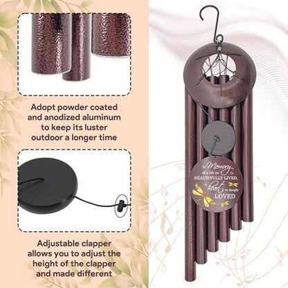 Dragonfly wind chime with speckled tubes, round medallion, and adjustable clapper detail.