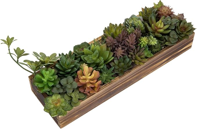 Angled view of a rustic brown wooden planter with faux succulents, mixed green and orange