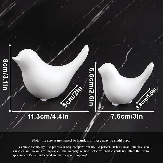 Ceramic white bird figurine set of 2 with size markings, curved sculpted silhouettes