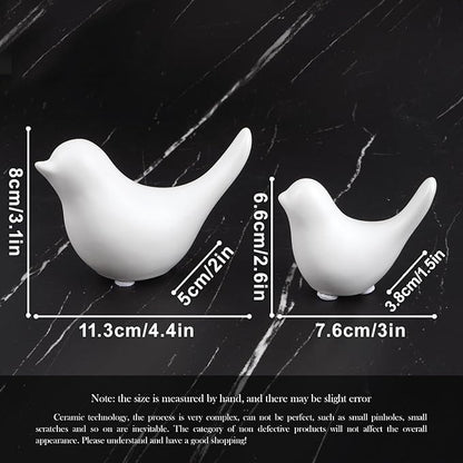 Ceramic white bird figurine set of 2 with size markings, curved sculpted silhouettes