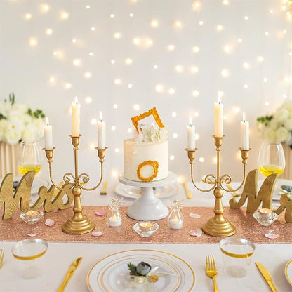 Gold 3-arm taper candle holder candelabra with decorative scroll arms and round base.