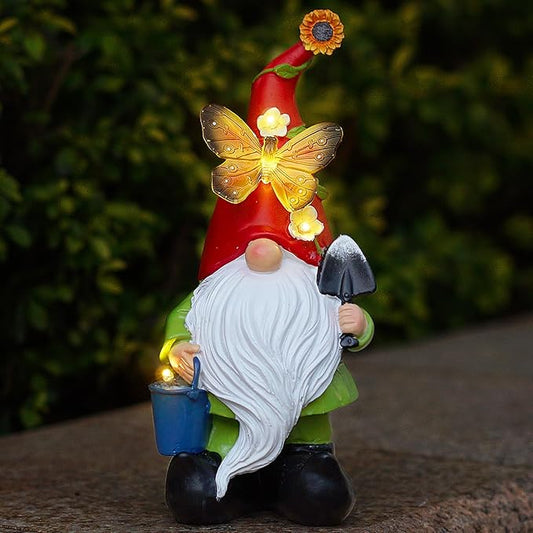 Solar LED garden gnome statue with butterfly ornament, red cap, white beard, blue bucket