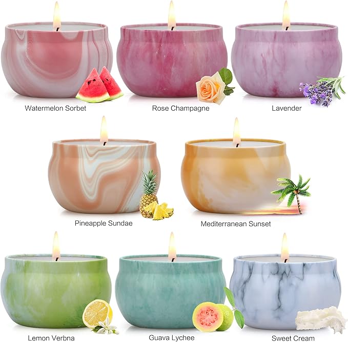8 pack scented soy candles with flames in pink, purple, beige, yellow, green, teal, and blue cups