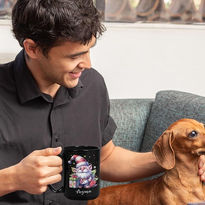 Black mug with holiday gnome illustration and name Benjamin, man holding mug near dog