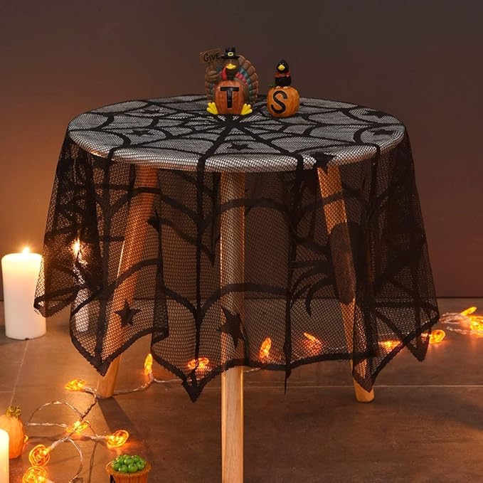 Round black Halloween table topper with spider web pattern and spider silhouettes