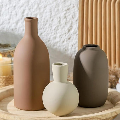 Set of 3 matte ceramic vases: tall terracotta brown, round cream, dark gray bottle