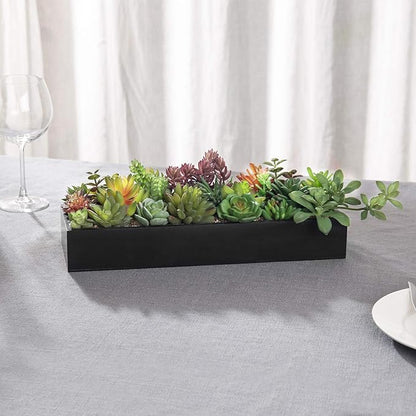Black rectangular planter faux succulents centerpiece with green and purple foliage