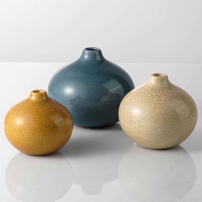 Set of 3 mini ceramic bud vases: blue, gold, and cream round bulbs.