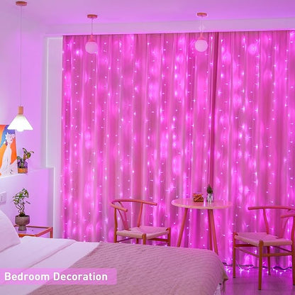 Pink LED curtain lights glowing behind a bedroom wall and window