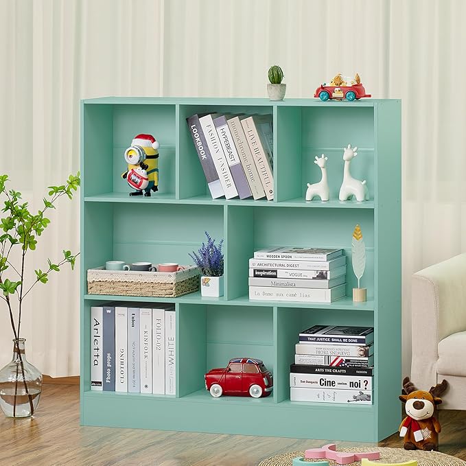 Mint green cube bookshelf with open cubbies displaying books and toys