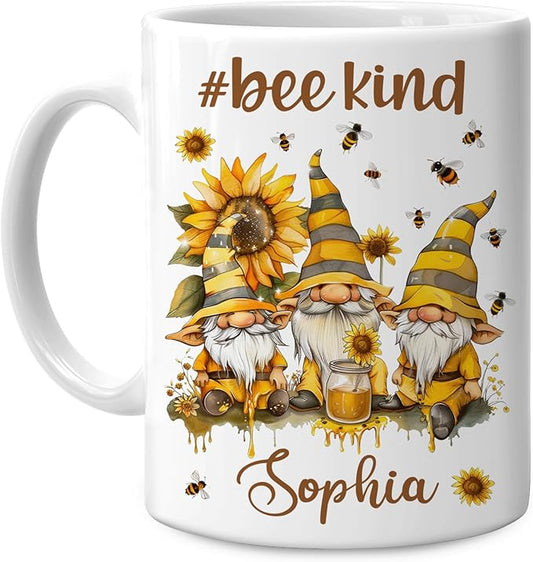 White ceramic mug with bee gnome scene, #bee kind text and Sophia name