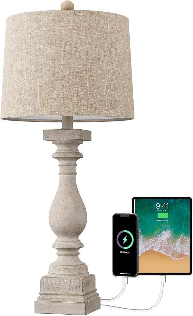 Farmhouse table lamp with beige fabric shade and visible USB charging ports on base