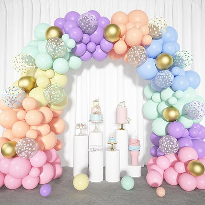 Pastel balloon arch garland with gold confetti, polka-dot, and solid balloons in rainbow hues