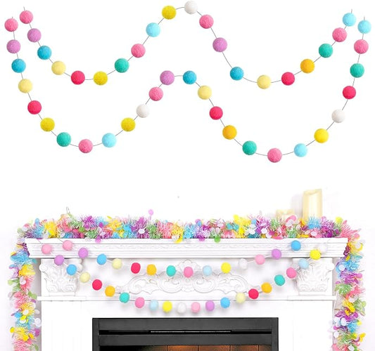 Colorful felt pom-pom garland with round balls in pink, blue, yellow, and teal on a string