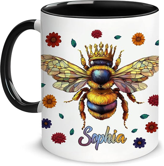 Ceramic coffee mug with black handle, bee crown artwork and floral pattern, name Sophia