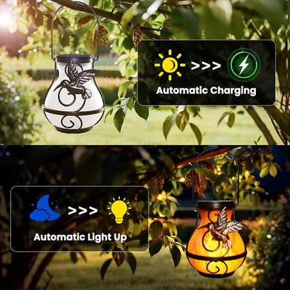 Solar lantern with angel flame glow hanging from hook among outdoor leaves