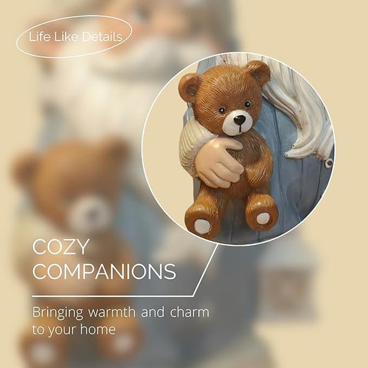 Close-up of blue resin gnome holding small brown teddy bear