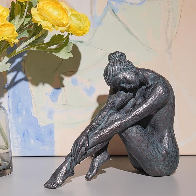 Guichifun resin statue of a seated woman stretching forward, with a dark bronze finish