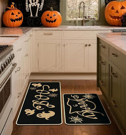 Set of 2 black Halloween kitchen rugs with gold ghosts and spider web accents