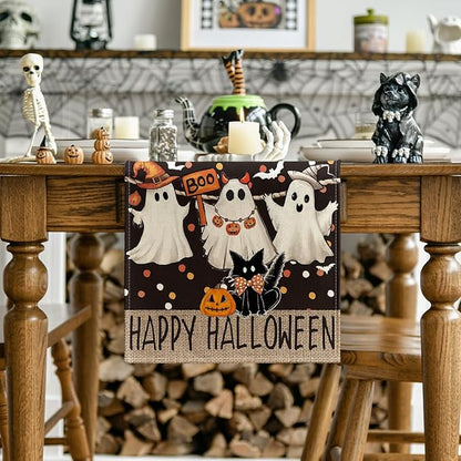 Halloween table runner featuring cartoon ghosts, black cat, jack-o’-lanterns, and “Happy Halloween”
