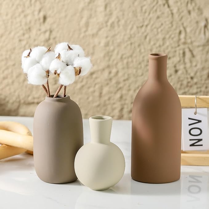 Set of 3 ceramic vases with matte finishes: terracotta, cream, and taupe-gray