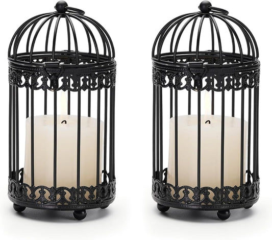 Black metal birdcage candle holder with domed top and curved bars, open center