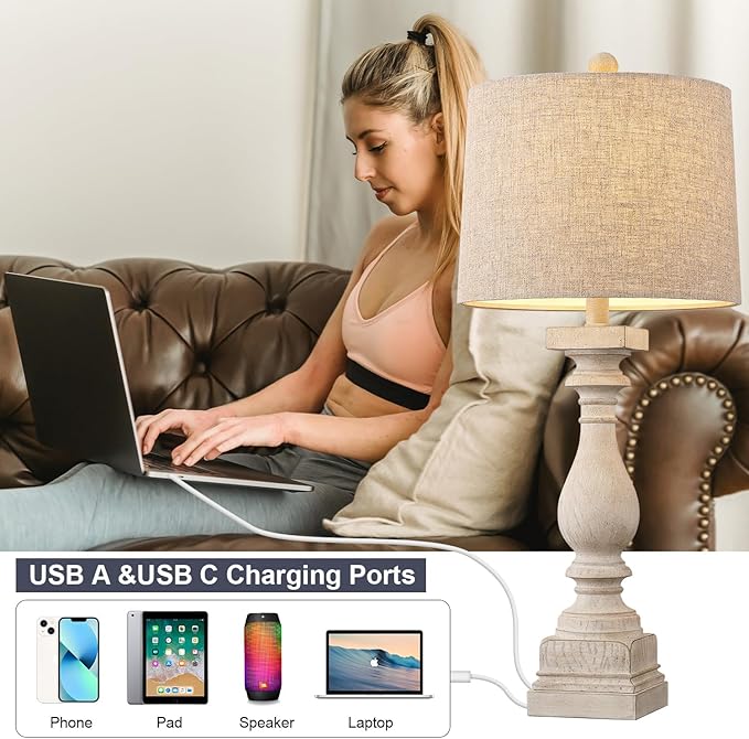Beige-shade farmhouse table lamp with USB charging ports beside seated person