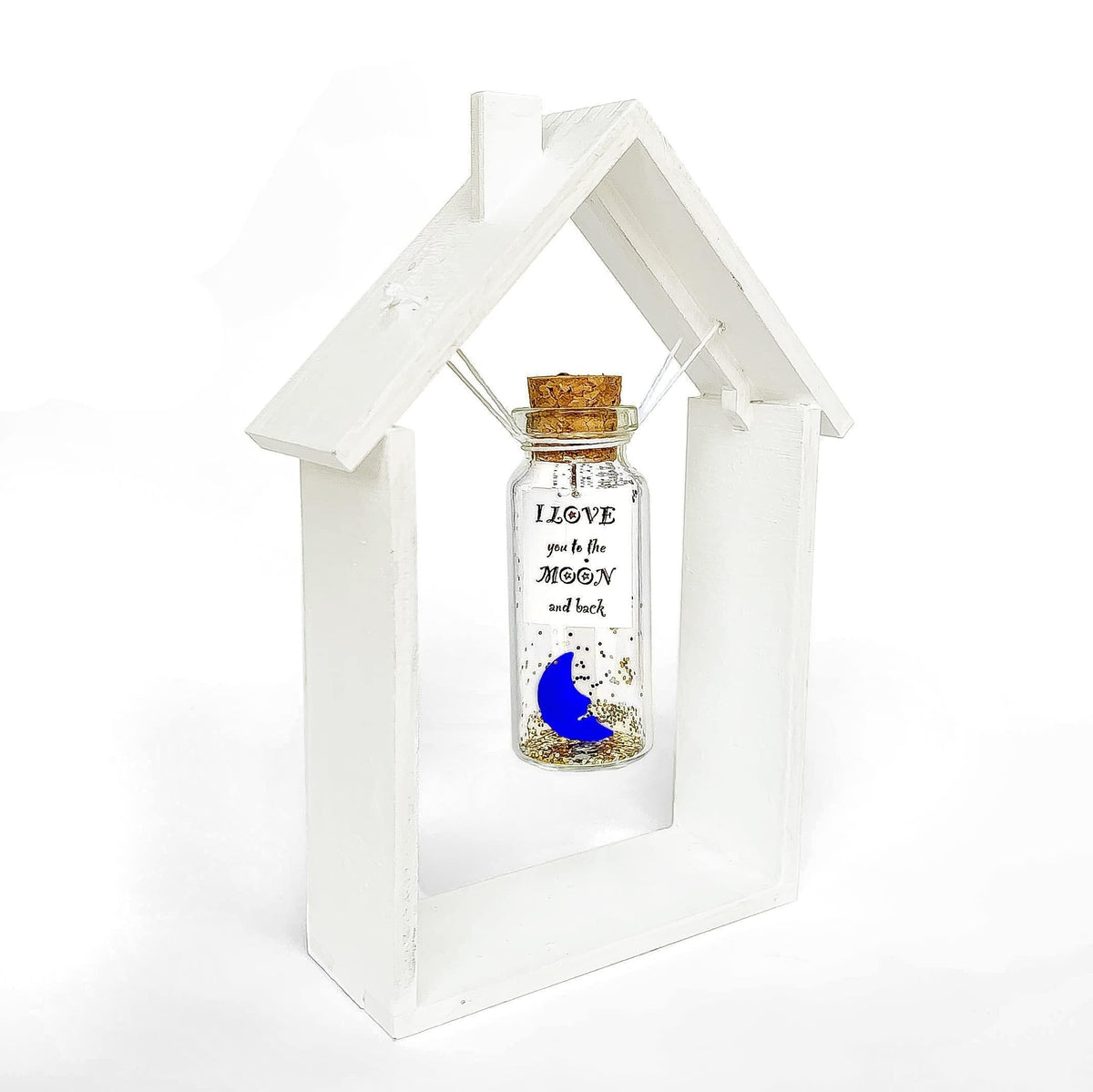 House-shaped wooden frame with glass message bottle and blue moon print