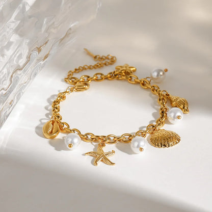 Gold Ocean Charm Bracelet – Starfish, Seashell, Seahorse & Pearl | 18K Gold Plated Stainless Steel | Adjustable 9.1" | Coastal Jewellery Gift for Her