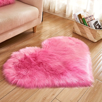 Rose pink heart-shaped plush area rug with thick soft faux fur