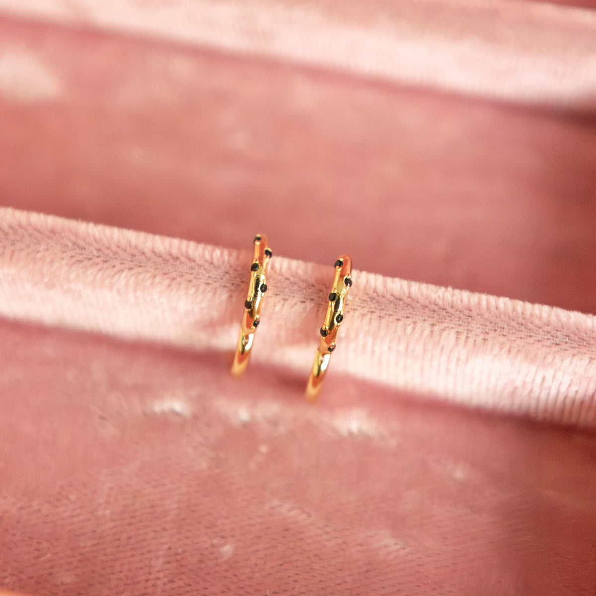 Pair of gold vermeil hoops with black imitation onyx dots