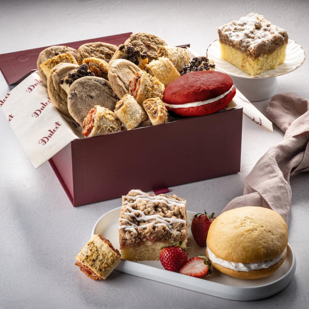 Bakery gift basket: assorted cookies and cake slices in a maroon box
