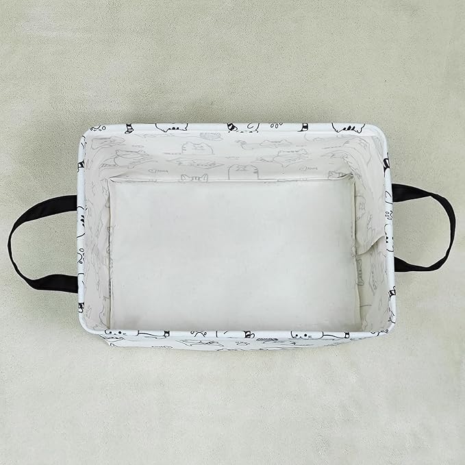 Rectangular canvas storage bin with cat print trim and two side carrying handles