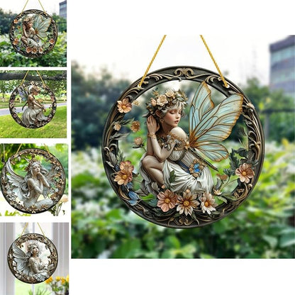 Round hanging fairy ornament with translucent blue wings, flowers, and an ornate dark frame