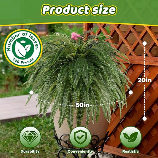 Large faux Boston fern plant with long green fronds in a black-and-green pot
