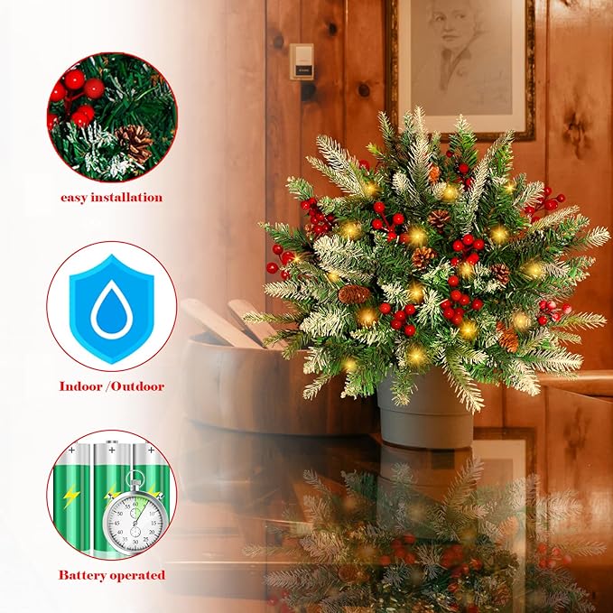 Battery-operated pre-lit artificial pine tree decoration with red berries and warm glowing lights