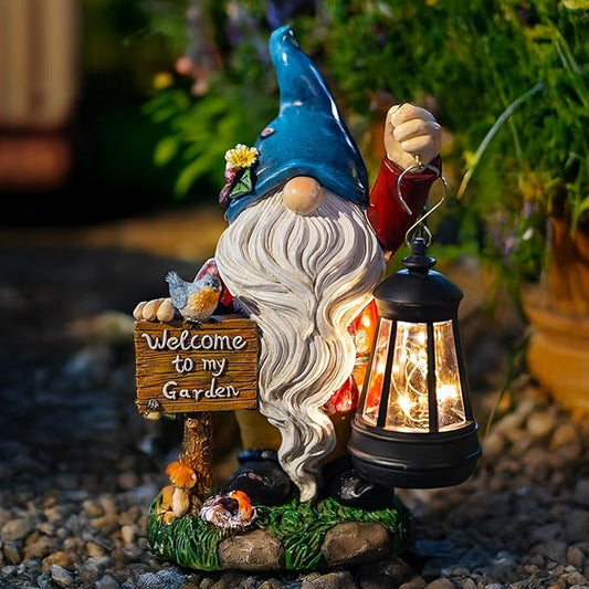 Garden gnome figurine with blue hat, white beard, and lit solar lantern on stone base