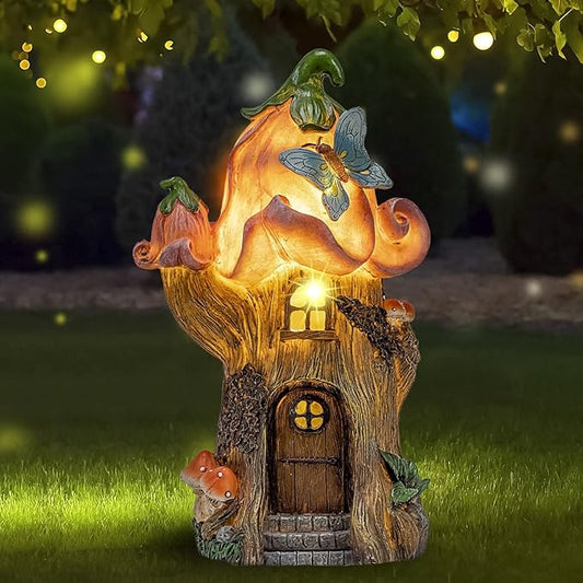 Solar-powered gnome mushroom house garden statue with glowing yellow light and door